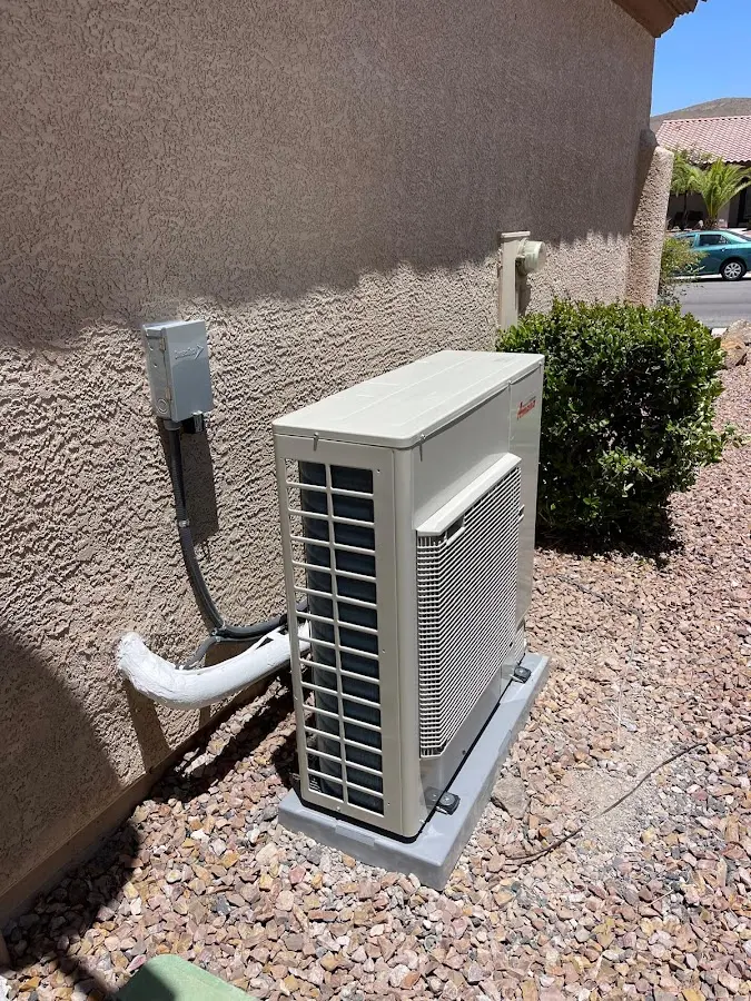Residential air conditioning condenser unit in Belle Glade